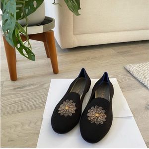 Rothy's Women’s Limited Holiday Licorice
Loafer Black+Gold Sunburst Flower 2018